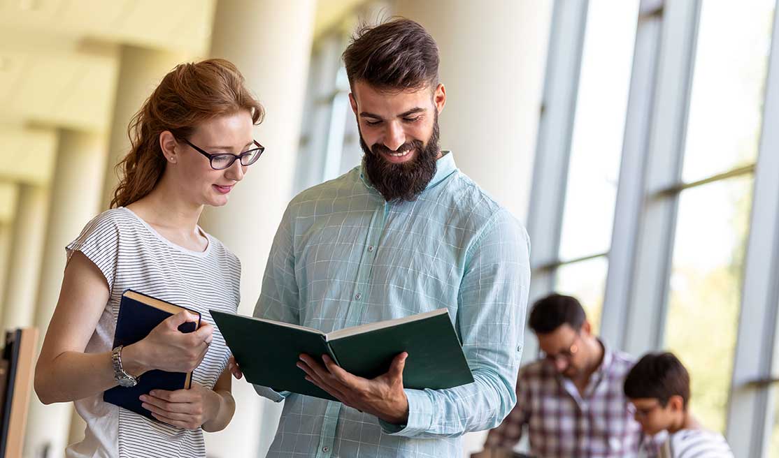 group of students studying and working